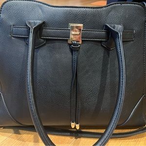 Black leather tote - very durable and spacious !